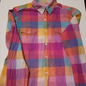 We are selling a button down shirt with plaid.